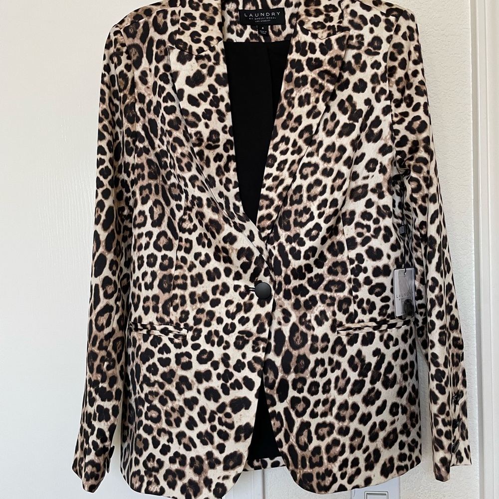 Leopard print jacket size 4 brand new.
